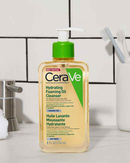 CeraVe Hydrating Foaming Oil Cleanser in a bathroom setting, perfect for normal to dry skin hydration.