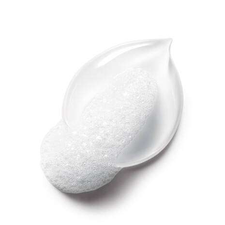 La Roche Posay Toleriane Caring Wash Hydrating Cleanser 200ml creamy texture on a leaf-shaped droplet.