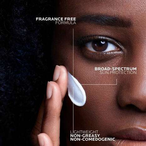 La Roche Posay Anthelios Invisible Fluid Facial Sunscreen SPF 50+ 50ml applied on skin for broad-spectrum sun protection.
