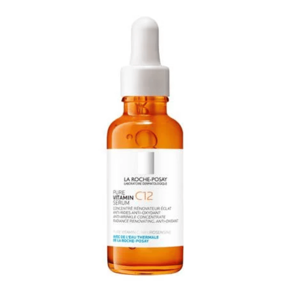 Vitamin C 12 Brightening Serum 30mL in a glass dropper bottle with orange serum inside.